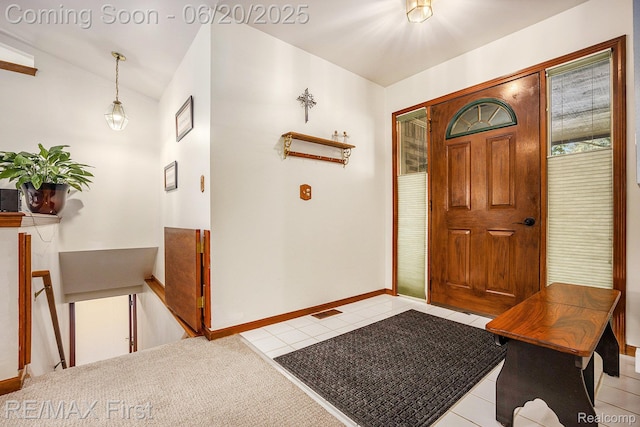 33550 24 Mile Rd, Chesterfield, MI 48047 - foyer with light tile patterned floors and lofted ceiling