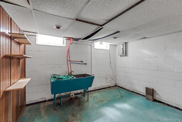 12892 Asbury Park, Detroit, MI 48227 - basement featuring tile patterned floors and a sink
