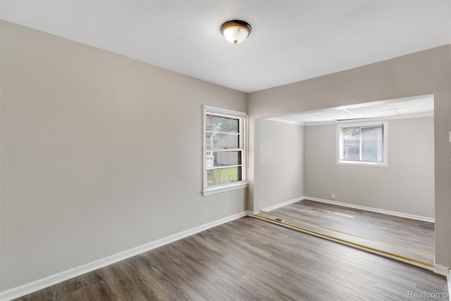12892 Asbury Park, Detroit, MI 48227 - spare room featuring wood finished floors and baseboards