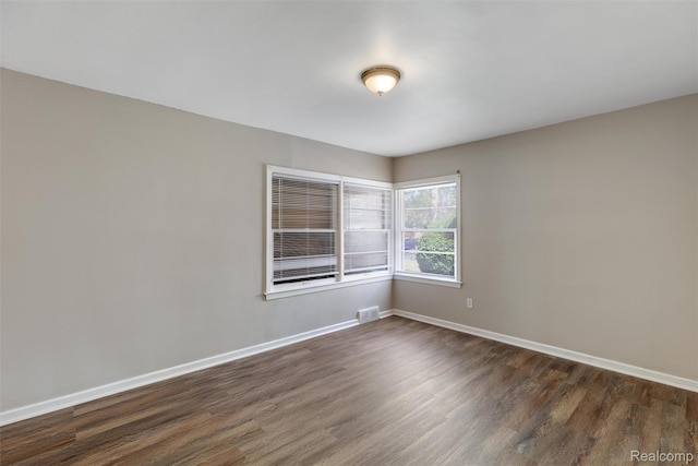 12892 Asbury Park, Detroit, MI 48227 - spare room with dark wood finished floors