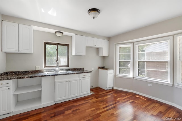 12892 Asbury Park, Detroit, MI 48227 - kitchen featuring white cabinets, wood finished floors, open shelves, and dark stone countertops