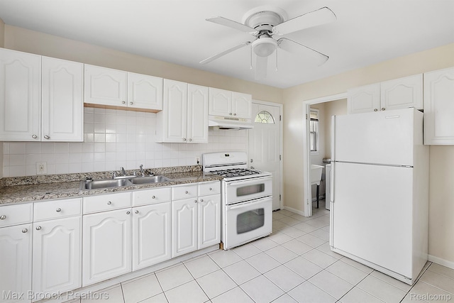 561 E Bennett Ave, Ferndale, MI 48220 - kitchen with white appliances, under cabinet range hood, white cabinets, and a ceiling fan