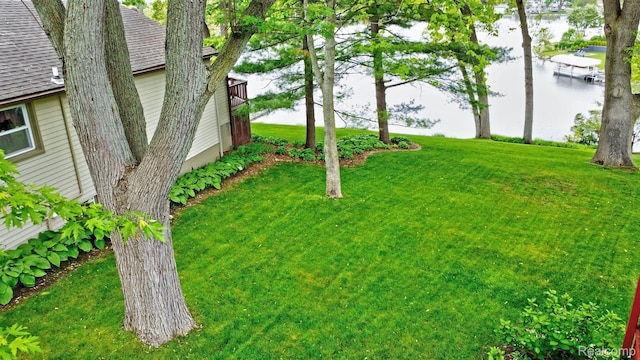 4030 Rollins Ave, Waterford, MI 48329 - view of grassy yard featuring a water view