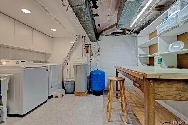 4030 Rollins Ave, Waterford, MI 48329 - unfinished below grade area featuring a water pressure tank and washer and clothes dryer
