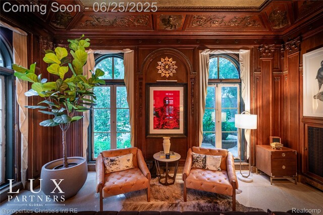 2150 Iroquois St, Detroit, MI 48201 - sitting room featuring wooden walls and crown molding