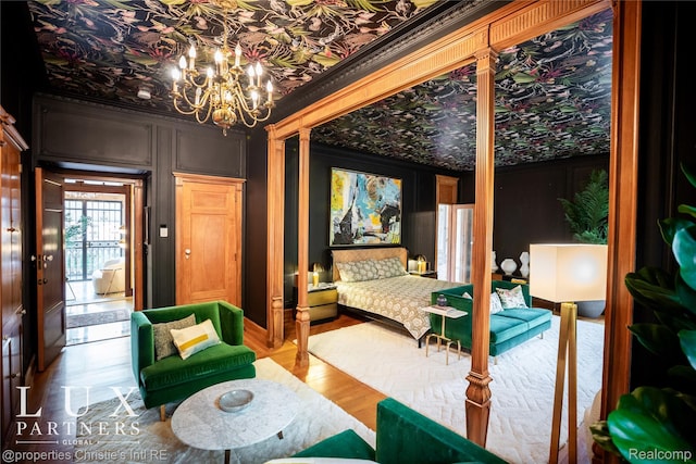 2150 Iroquois St, Detroit, MI 48201 - bedroom featuring a chandelier, wood finished floors, and crown molding