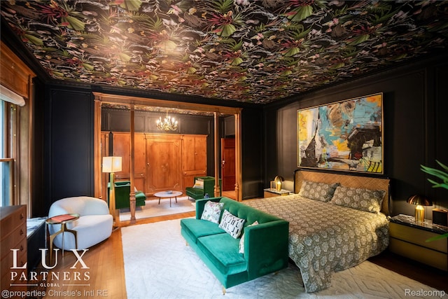 2150 Iroquois St, Detroit, MI 48201 - bedroom featuring wood finished floors and an ornate ceiling