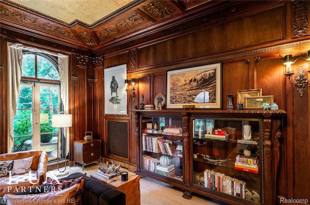 2150 Iroquois St, Detroit, MI 48201 - sitting room featuring wooden walls and ornamental molding