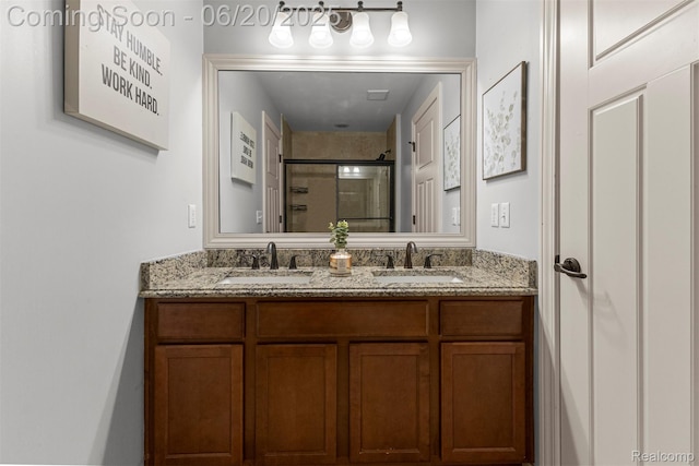 23736 Point O Woods Ct, South Lyon, MI 48178 - bathroom featuring a stall shower and double vanity