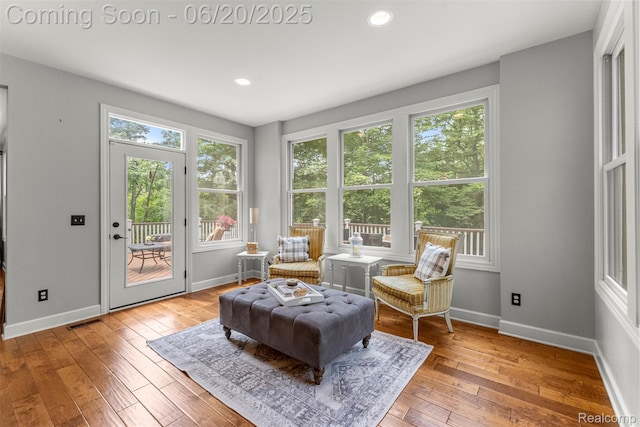 23736 Point O Woods Ct, South Lyon, MI 48178 - sitting room with hardwood / wood-style flooring and recessed lighting