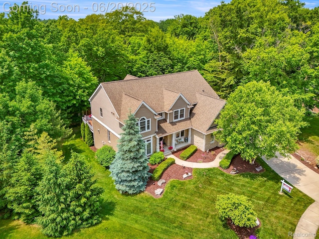 23736 Point O Woods Ct, South Lyon, MI 48178 - view from above of property featuring a heavily wooded area