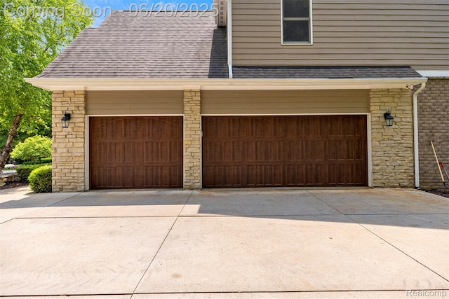 23736 Point O Woods Ct, South Lyon, MI 48178 - garage with driveway