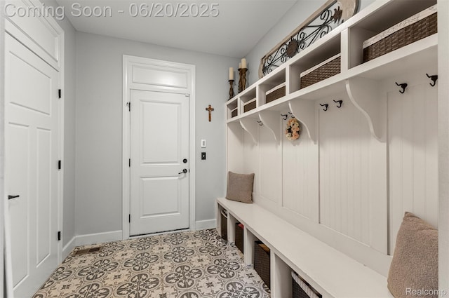 23736 Point O Woods Ct, South Lyon, MI 48178 - mudroom featuring baseboards