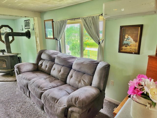 350 S Catalpa Ave, White Cloud, MI 49349 - carpeted living room featuring a wall mounted AC and a wood stove