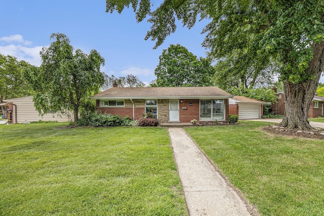 32530 Halmich Dr, Warren, MI 48092 - view of front facade featuring a front yard, brick siding, and a chimney
