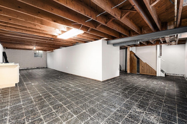 32530 Halmich Dr, Warren, MI 48092 - basement with stairs and dark flooring
