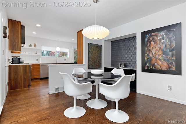 6895 Cedarbrook Dr, Bloomfield Hills, MI 48301 - dining space featuring dark wood finished floors and recessed lighting