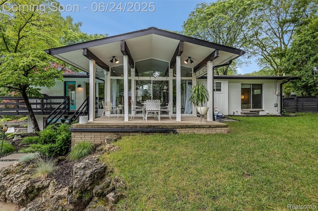 6895 Cedarbrook Dr, Bloomfield Hills, MI 48301 - back of house featuring brick siding