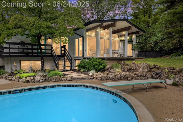 6895 Cedarbrook Dr, Bloomfield Hills, MI 48301 - outdoor pool with stairs and a diving board
