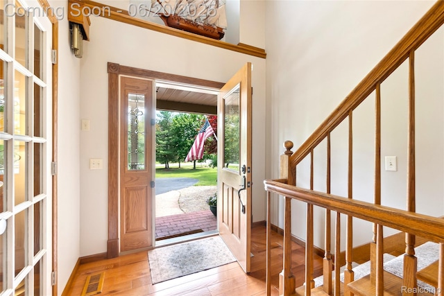 459 N Elms Rd, Flushing, MI 48433 - entrance foyer with stairway and light wood-style floors