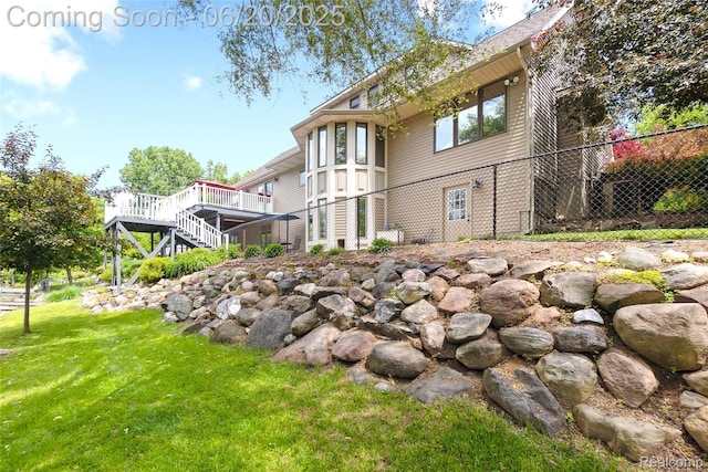 459 N Elms Rd, Flushing, MI 48433 - rear view of property featuring a deck and stairway