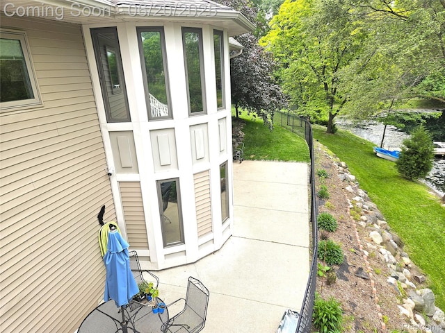 459 N Elms Rd, Flushing, MI 48433 - property entrance featuring a patio area