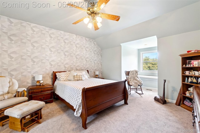 459 N Elms Rd, Flushing, MI 48433 - carpeted bedroom with wallpapered walls, lofted ceiling, and a ceiling fan