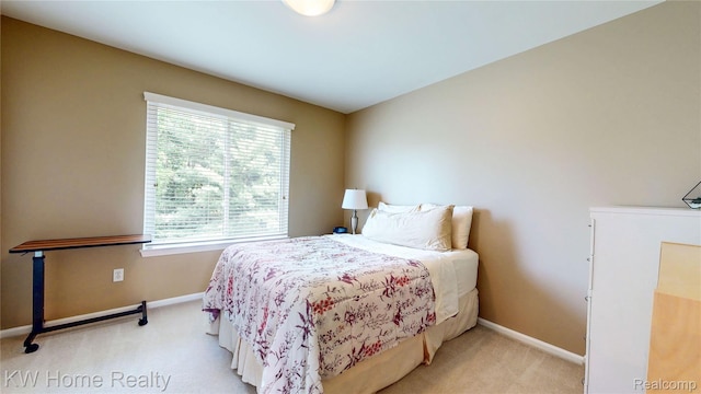 2836 Otter Ct, Wixom, MI 48393 - bedroom with light colored carpet and baseboards