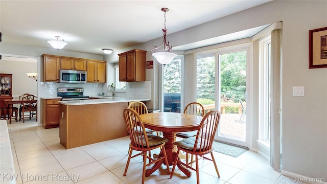 2836 Otter Ct, Wixom, MI 48393 - dining area featuring light tile patterned flooring