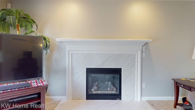 2836 Otter Ct, Wixom, MI 48393 - detailed view of a fireplace and baseboards