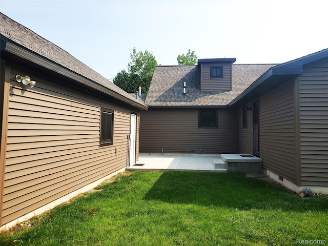 115 Choctaw Trl, Prudenville, MI 48651 - view of grassy yard with a patio