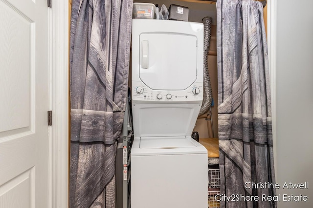 1495 Yeckley Rd, Hastings, MI 49058 - laundry room featuring stacked washer and clothes dryer