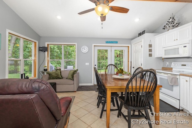 1495 Yeckley Rd, Hastings, MI 49058 - dining space featuring light tile patterned floors, lofted ceiling, ceiling fan, recessed lighting, and french doors