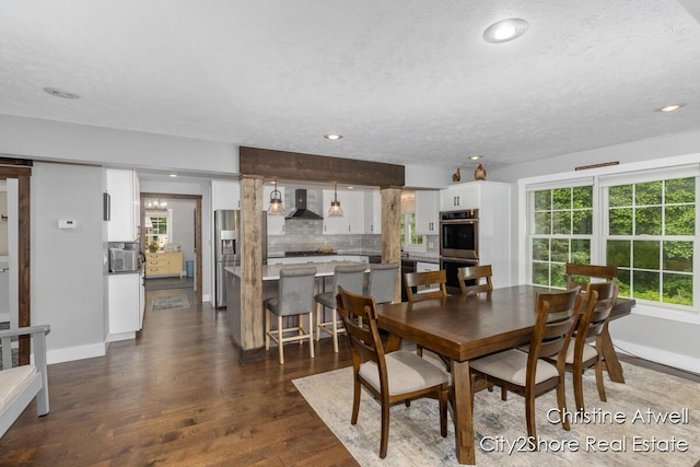 1495 Yeckley Rd, Hastings, MI 49058 - dining area featuring dark wood-style floors, recessed lighting, and a textured ceiling