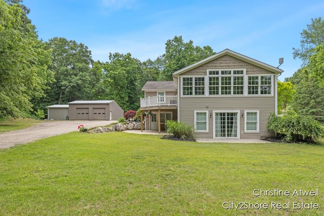1495 Yeckley Rd, Hastings, MI 49058 - back of property featuring a yard, an outdoor structure, a garage, and dirt driveway