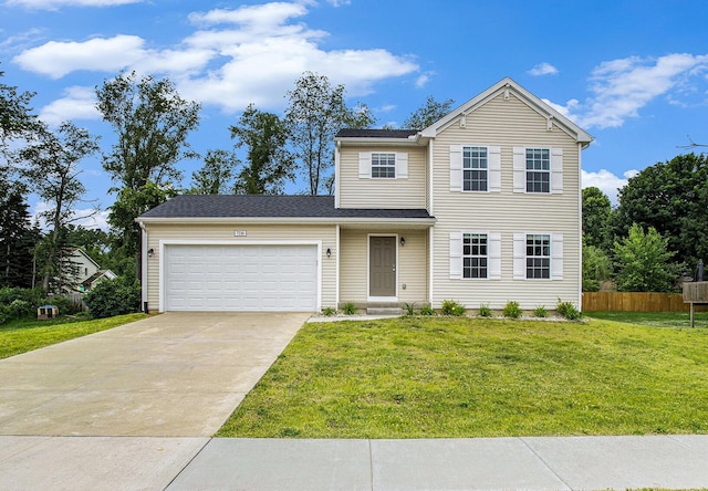 7216 Heartwood Ct, Portage, MI 49002 - traditional home featuring an attached garage and concrete driveway