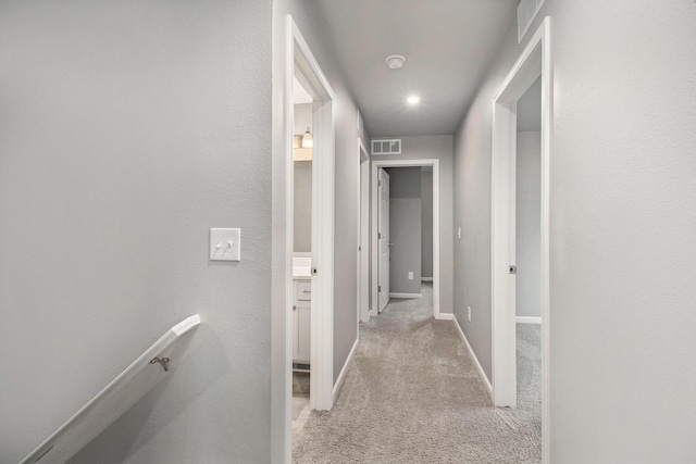 7216 Heartwood Ct, Portage, MI 49002 - hallway featuring carpet and baseboards