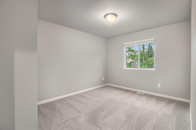7216 Heartwood Ct, Portage, MI 49002 - carpeted empty room with baseboards