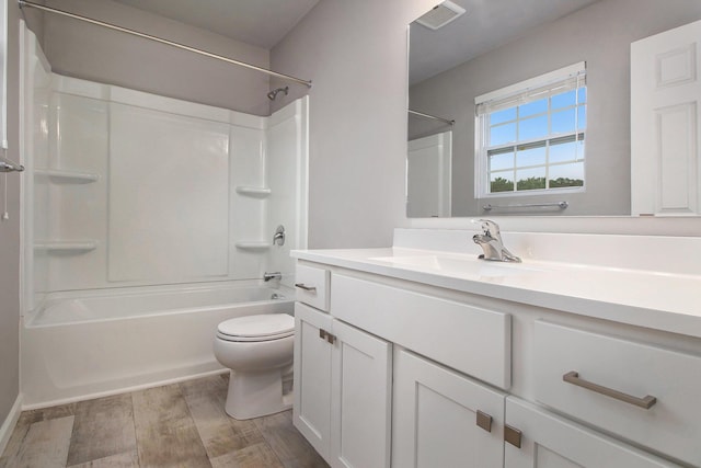 7216 Heartwood Ct, Portage, MI 49002 - bathroom with vanity,  shower combination, and wood finished floors