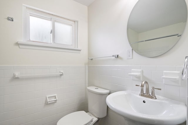 7710 Pelham Rd, Taylor, MI 48180 - bathroom with tile walls and a wainscoted wall