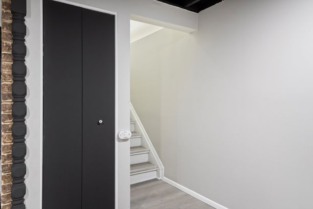7710 Pelham Rd, Taylor, MI 48180 - stairs with wood finished floors and baseboards