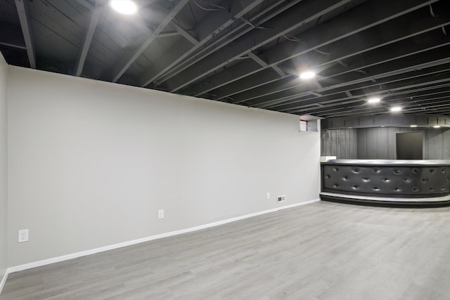 7710 Pelham Rd, Taylor, MI 48180 - finished basement with baseboards and wood finished floors