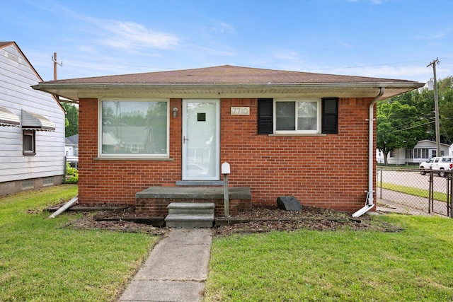 7710 Pelham Rd, Taylor, MI 48180 - bungalow-style home with brick siding