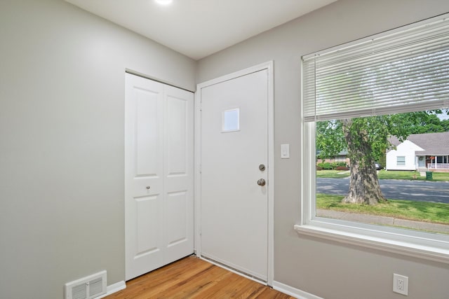 7710 Pelham Rd, Taylor, MI 48180 - entrance foyer with light wood-style flooring and baseboards