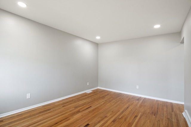 7710 Pelham Rd, Taylor, MI 48180 - spare room with wood finished floors and recessed lighting