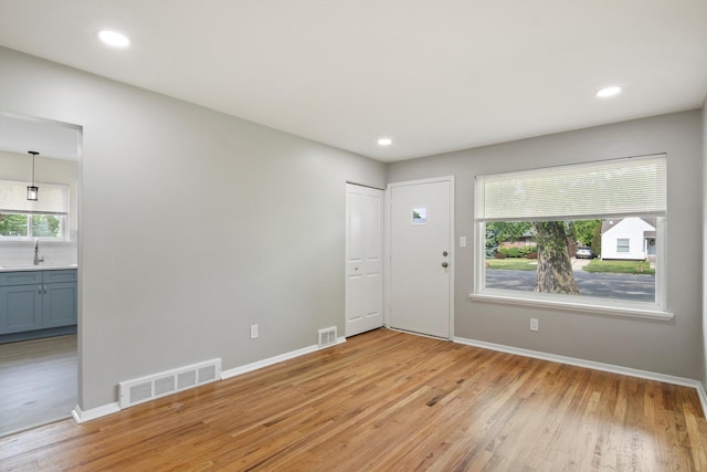 7710 Pelham Rd, Taylor, MI 48180 - entryway with light wood-style flooring and recessed lighting