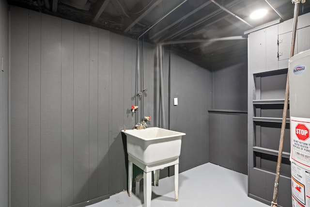 7710 Pelham Rd, Taylor, MI 48180 - unfinished below grade area featuring gas water heater