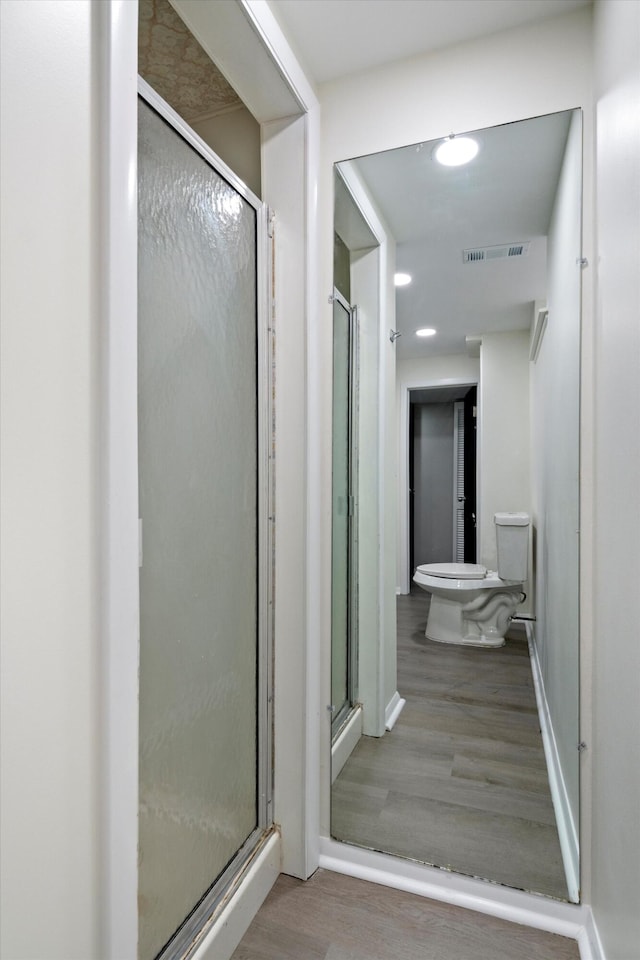 7710 Pelham Rd, Taylor, MI 48180 - bathroom with wood finished floors and a shower stall