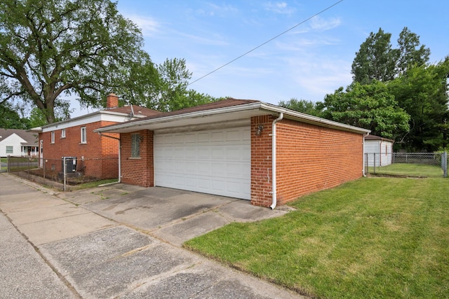 7710 Pelham Rd, Taylor, MI 48180 - garage with concrete driveway