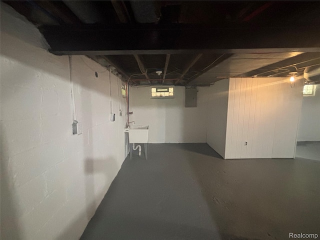 910 Spence St, Southfield, MI 48340 - basement featuring a sink and electric panel